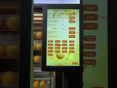 Le distributeur automatique de jus d' orange fraîchement pressé