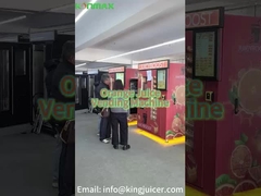 Le distributeur automatique de jus d' orange fraîchement pressé